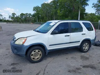 2005 Honda CR-V LX with VIN JHLRD68565C005484, listed as a IAAI auction lot 41983513 with 215,839 mi miles. Bid and sale history available at carsss.com. Image 2.
