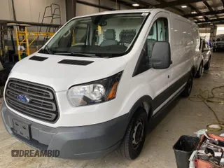 2016 Ford Transit Cargo z VIN 1FTYE1YM3GKB18575, wystawiony jako IAAI lot #42734024 z przebiegiem 186 138 mil mil oraz . Historia ofert i sprzedaży dostępna na DreamBid. Obrazek 28.