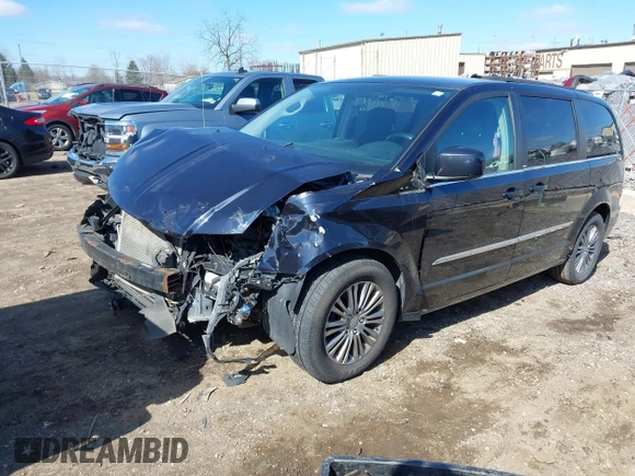 2011 Chrysler Town & Country Touring with VIN 2A4RR5DG4BR614120, listed as a IAAI auction lot 41886641 with 212,414 mi miles. Bid and sale history available at carsss.com. Image 2.