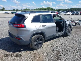 2016 Jeep Cherokee Sport with VIN 1C4PJLAB0GW369428, listed as a IAAI auction lot 42264097 with 130,952 mi miles and . Bid and sale history available at DreamBid. Image 4.