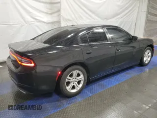 2019 Dodge Charger SXT with VIN 2C3CDXBG7KH657997, listed as a Copart auction lot 52040545 with 163,735 mi miles and Clean Title. Bid and sale history available at carsss.com. Image 3.