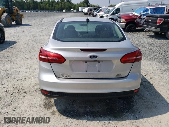 2016 Ford Focus SE with VIN 1FADP3FE8GL353103, listed as a Copart auction lot 64972865 with 131,403 mi miles and Clean title. Bid and sale history available at DreamBid. Image 6.