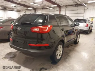 2013 Kia Sportage LX with VIN KNDPB3A22D7441703, listed as a IAAI auction lot 41420552 with 176,619 mi miles. Bid and sale history available at carsss.com. Image 4.