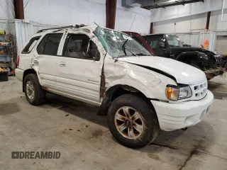 2001 Isuzu Rodeo S with VIN 4S2CK58W114324439, listed as a Copart auction lot 70426714 with Not Provided miles and Non Repairable. Bid and sale history available at DreamBid. Image 4.
