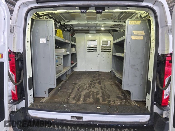 2016 Ford Transit Cargo z VIN 1FTYE1YM9GKB18600, wystawiony jako IAAI lot #42726792 z przebiegiem 127 434 mil mil oraz . Historia ofert i sprzedaży dostępna na DreamBid. Obrazek 1.