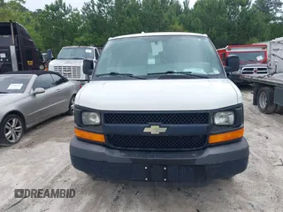 2013 Chevrolet Express Cargo with VIN 1GCSGAFX2D1148701, listed as a IAAI auction lot 42215285 with 265,463 mi miles and . Bid and sale history available at DreamBid. Image 12.