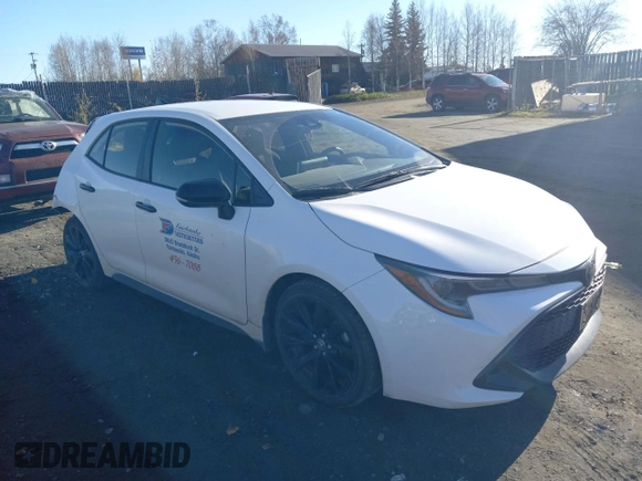 2021 Toyota Corolla Hatchback SE with VIN JTND4MBE7M3141993, listed as a Copart auction lot 73617514 with 20,029 mi miles and Salvage Title. Bid and sale history available at carsss.com. Image 4.
