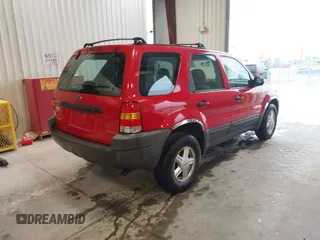 2001 Ford Escape XLS with VIN 1FMYU02191KE79727, listed as a IAAI auction lot 41720383 with 223,554 mi miles. Bid and sale history available at carsss.com. Image 4.
