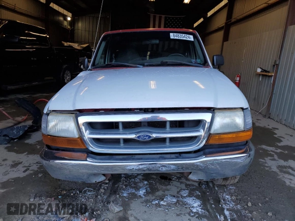 1999 Ford Ranger XL with VIN 1FTYR10C7XPB67854, listed as a Copart auction lot 86255294 with 169,102 mi miles and Salvage title. Bid and sale history available at DreamBid. Image 5.