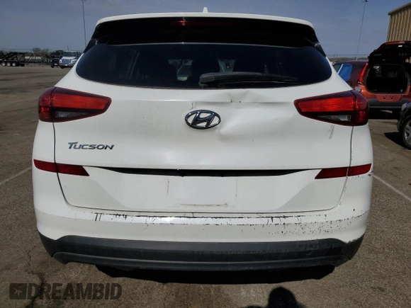 2019 Hyundai Tucson Value z VIN KM8J33A4XKU956155, wystawiony jako Copart lot #53487735 z przebiegiem 84 453 mil mil oraz Czysty tytuł • Clean title. Historia ofert i sprzedaży dostępna na DreamBid. Obrazek 6.