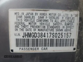 2007 Honda Fit with VIN JHMGD38417S025157, listed as a Copart auction lot 72768984 with 128,944 mi miles and Clean Title. Bid and sale history available at carsss.com. Image 12.