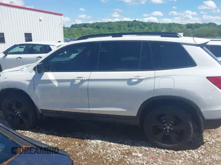 2019 Honda Passport Elite z VIN 5FNYF8H0XKB000774, wystawiony jako IAAI lot #42153669 z przebiegiem 65 415 mil mil oraz . Historia ofert i sprzedaży dostępna na DreamBid. Obrazek 14.