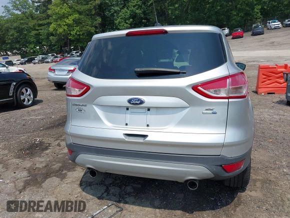 2013 Ford Escape SE z VIN 1FMCU9GX9DUB09981, wystawiony jako IAAI lot #42412927 z przebiegiem 150 499 mil mil oraz . Historia ofert i sprzedaży dostępna na DreamBid. Obrazek 16.