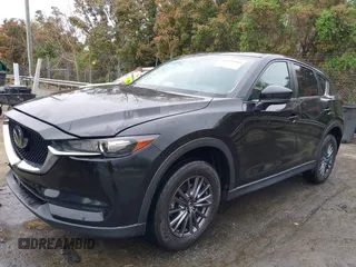 2020 Mazda CX-5 Touring with VIN JM3KFACM9L0770933, listed as a IAAI auction lot 41921464 with 75,997 mi miles. Bid and sale history available at carsss.com. Image 17.