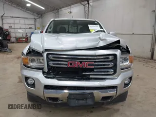 2015 GMC Canyon 4WD SLE z VIN 1GTG6BE39F1252926, wystawiony jako IAAI lot #42128396 z przebiegiem 113 139 mil mil oraz . Historia ofert i sprzedaży dostępna na DreamBid. Obrazek 12.