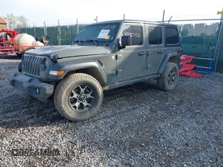 2019 Jeep Wrangler Unlimited Sport S with VIN 1C4HJXDG6KW578720, listed as a IAAI auction lot 42057153 with 65,719 mi miles and . Bid and sale history available at DreamBid. Image 19.