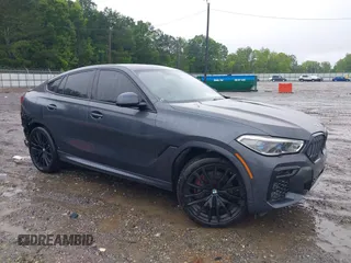 2022 BMW X6 xDrive40i z VIN 5UXCY6C08N9J52159, wystawiony jako IAAI lot #42227557 z przebiegiem 68 165 mil mil oraz . Historia ofert i sprzedaży dostępna na DreamBid. Obrazek 1.