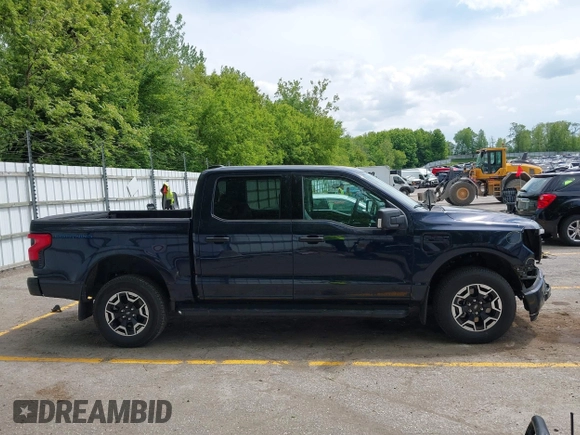 2023 Ford F-150 Lightning Pro with VIN 1FTVW1EL6PWG30061, listed as a IAAI auction lot 42362295 with 22,481 mi miles and . Bid and sale history available at DreamBid. Image 13.