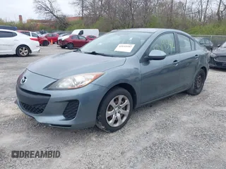2012 Mazda Mazda3 i Sport with VIN JM1BL1UF0C1640650, listed as a IAAI auction lot 42019342 with 144,611 mi miles. Bid and sale history available at carsss.com. Image 2.