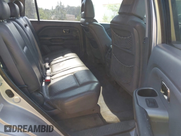 2004 Honda Pilot EX with VIN 2HKYF18504H556213, listed as a IAAI auction lot 42137221 with 225,781 mi miles and . Bid and sale history available at DreamBid. Image 8.