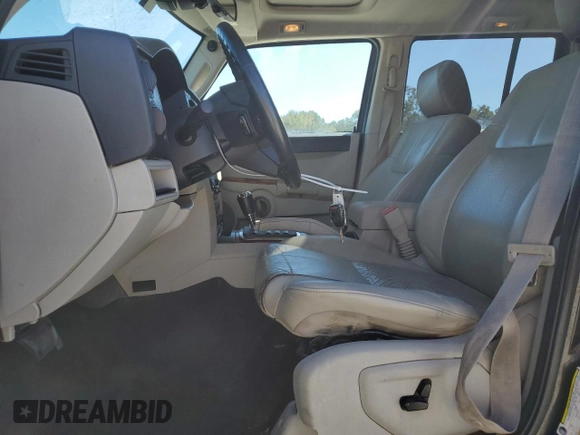 2006 Jeep Commander Limited with VIN 1J8HH58N56C291880, listed as a Copart auction lot 71543874 with 217,366 mi miles and Salvage title. Bid and sale history available at DreamBid. Image 7.