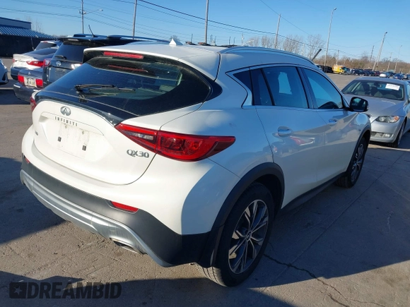 2018 Infiniti QX30 Premium with VIN SJKCH5CR1JA044904, listed as a IAAI auction lot 41849804 with 135,385 mi miles and . Bid and sale history available at DreamBid. Image 4.