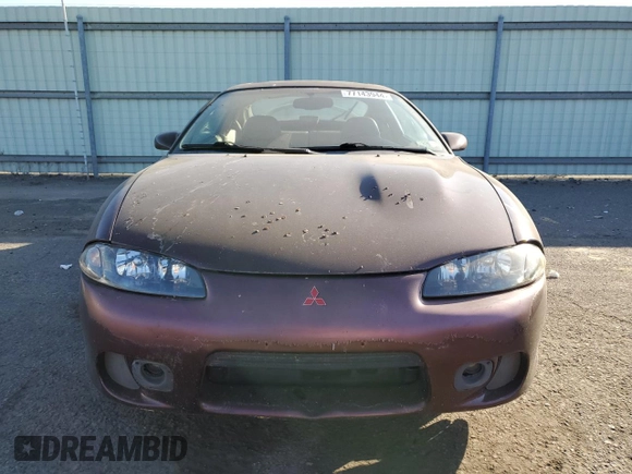 1999 Mitsubishi Eclipse with VIN 4A3AK44Y1XE074155, listed as a Copart auction lot 77143944 with 105,262 mi miles and Clean Title. Bid and sale history available at DreamBid. Image 5.