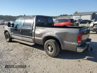 2003 Ford Super Duty F-250 XL with VIN 1FTNW20F73EB02536, listed as a Copart auction lot 77330394 with 170,102 mi miles and Salvage Title. Bid and sale history available at carsss.com. Image 2.