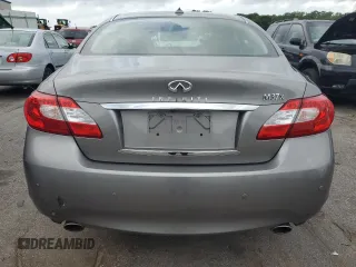 2013 Infiniti M with VIN JN1BY1AR4DM601451, listed as a Copart auction lot 65723894 with 129,872 mi miles and Clean Title. Bid and sale history available at DreamBid. Image 6.