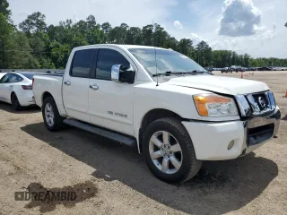 2010 Nissan Titan SE with VIN 1N6BA0ED1AN323167, listed as a Copart auction lot 60237535 with 135,182 mi miles and Salvage title. Bid and sale history available at DreamBid. Image 4.