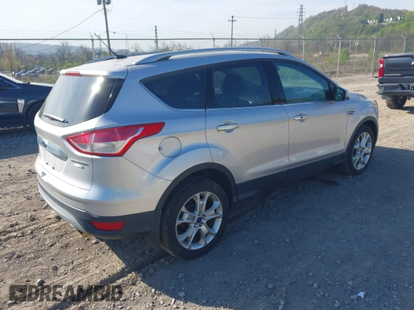 2016 Ford Escape Titanium with VIN 1FMCU9JX2GUA50916, listed as a IAAI auction lot 42118711 with 121,405 mi miles. Bid and sale history available at carsss.com. Image 4.