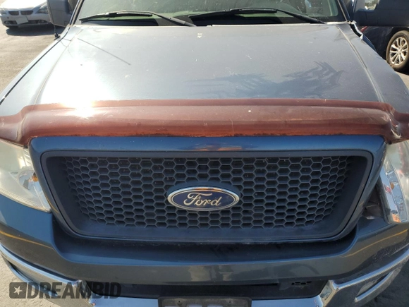 2005 Ford F-150 XLT z VIN 1FTPX14535NB48627, wystawiony jako Copart lot #59626875 z przebiegiem 120 894 mil mil oraz Szkoda całkowita • Salvage title. Historia ofert i sprzedaży dostępna na DreamBid. Obrazek 11.