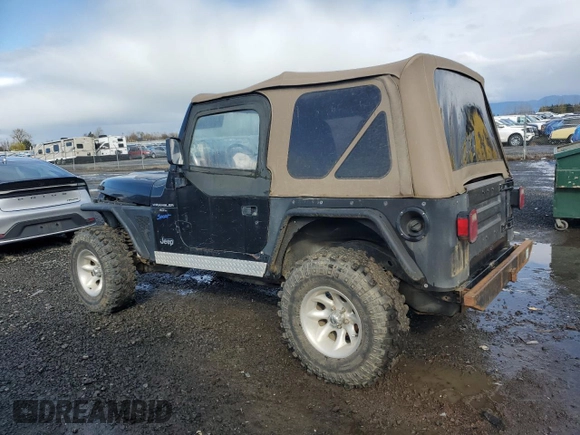1998 Jeep Wrangler Sport with VIN 1J4FY19S5WP717503, listed as a Copart auction lot 49188195 with 180,717 mi miles and Salvage Title. Bid and sale history available at carsss.com. Image 2.