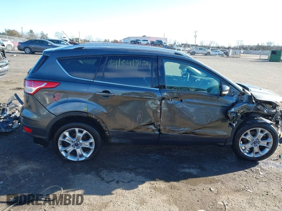 2016 Ford Escape Titanium с VIN 1FMCU9J91GUA72102, выставлен на аукционе IAAI как лот 41641812 с пробегом 166 688 миль миль и . История ставок и продаж доступна на DreamBid. Изображение 14.