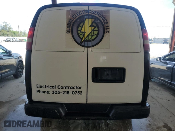 2006 Chevrolet Express Cargo with VIN 1GCGG25V961171309, listed as a Copart auction lot 64814815 with 199,033 mi miles and Salvage title. Bid and sale history available at DreamBid. Image 6.