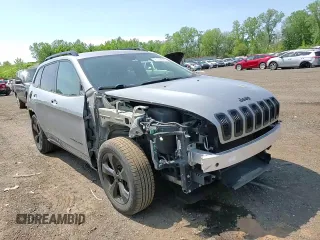 2016 Jeep Cherokee Altitude with VIN 1C4PJMCB2GW225883, listed as a Copart auction lot 55726885 with 142,802 mi miles and Salvage title. Bid and sale history available at DreamBid. Image 14.