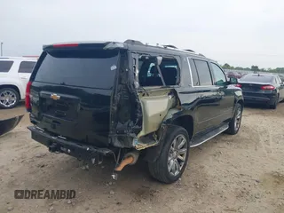 2015 Chevrolet Suburban LTZ with VIN 1GNSCKKCXFR731873, listed as a IAAI auction lot 42069917 with 108,963 mi miles and . Bid and sale history available at DreamBid. Image 6.