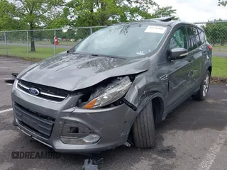 2013 Ford Escape SEL z VIN 1FMCU9H96DUC66206, wystawiony jako IAAI lot #42376442 z przebiegiem 96 776 mil mil oraz . Historia ofert i sprzedaży dostępna na DreamBid. Obrazek 6.