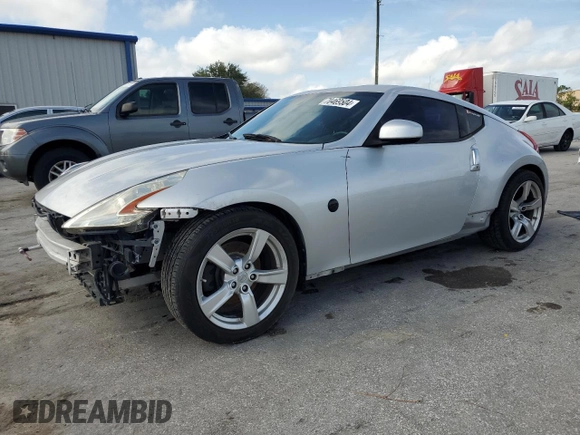 2010 Nissan 370Z Touring with VIN JN1AZ4EH2AM506507, listed as a Copart auction lot 70469504 with 115,594 mi miles and Salvage Title. Bid and sale history available at carsss.com. Image 1.
