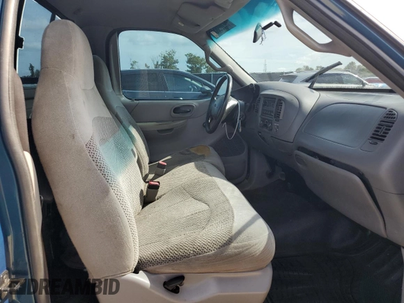 2000 Ford F-150 XL z VIN 3FTZF172XYMA81391, wystawiony jako Copart lot #62108855 z przebiegiem Nie podano mil oraz Szkoda całkowita • Salvage title. Historia ofert i sprzedaży dostępna na DreamBid. Obrazek 10.