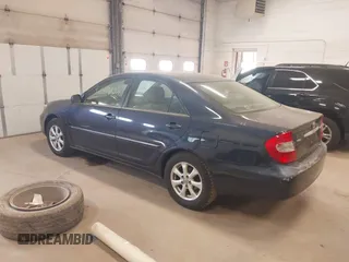 2002 Toyota Camry LE z VIN 4T1BE32K82U626817, wystawiony jako IAAI lot #42157820 z przebiegiem 200 810 mil mil oraz . Historia ofert i sprzedaży dostępna na DreamBid. Obrazek 3.