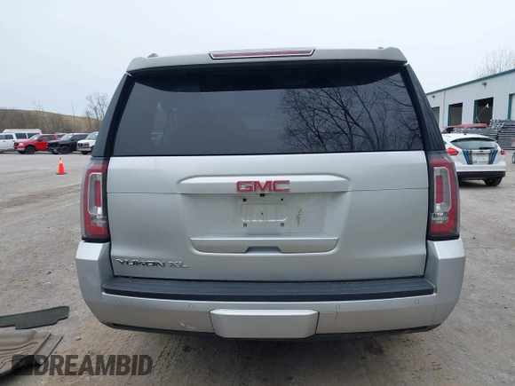 2016 GMC Yukon XL SLT with VIN 1GKS2GKC7GR244161, listed as a IAAI auction lot 41971443 with 215,171 mi miles and . Bid and sale history available at DreamBid. Image 17.