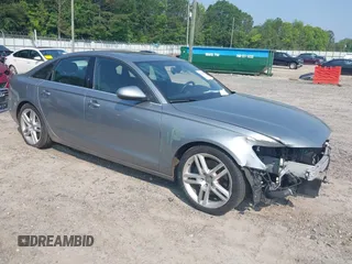 2015 Audi A6 Premium Plus with VIN WAUGFAFC7FN005497, listed as a IAAI auction lot 42402477 with 79,334 mi miles and . Bid and sale history available at DreamBid. Image 1.