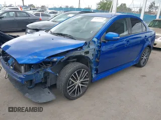 2017 Mitsubishi Lancer ES with VIN JA32V2FW2HU010095, listed as a IAAI auction lot 41899996 with 136,889 mi miles. Bid and sale history available at carsss.com. Image 18.