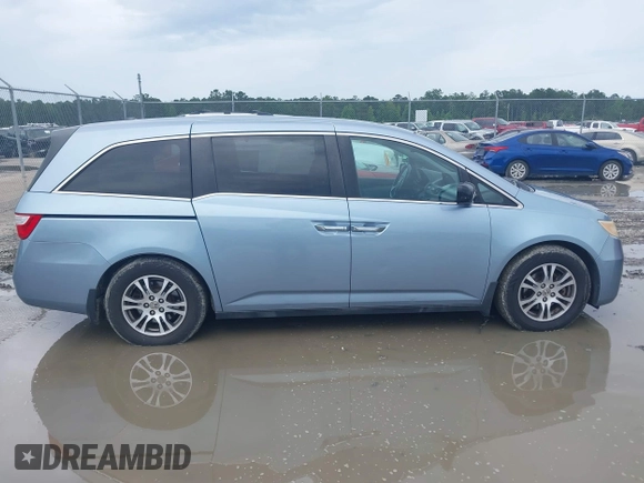 2013 Honda Odyssey EX-L с VIN 5FNRL5H6XDB090432, выставлен на аукционе IAAI как лот 42468409 с пробегом Не указан миль и . История ставок и продаж доступна на DreamBid. Изображение 13.