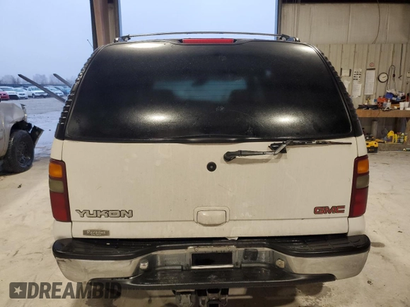 2000 GMC Yukon SLT with VIN 1GKEC13T9YJ159294, listed as a Copart auction lot 82626544 with 0 mi miles and Salvage Title. Bid and sale history available at carsss.com. Image 6.