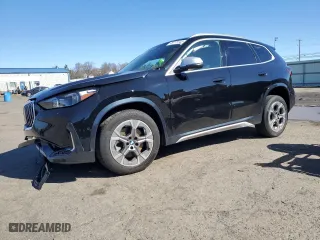 2024 BMW X1 xDrive28i with VIN WBX73EF06R5Y43830, listed as a Copart auction lot 49773145 with 15,406 mi miles and Salvage Title. Bid and sale history available at carsss.com. Image 1.