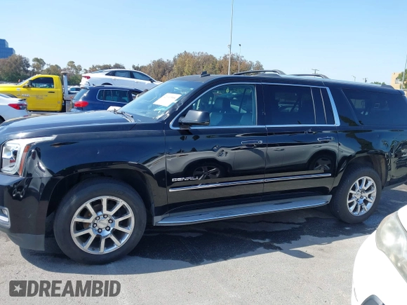2015 GMC Yukon XL Denali with VIN 1GKS1JKJ1FR134428, listed as a IAAI auction lot 42149588 with 116,207 mi miles. Bid and sale history available at carsss.com. Image 14.