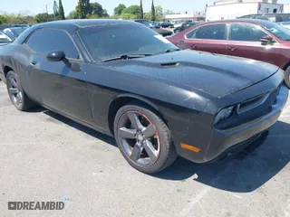 2013 Dodge Challenger SXT with VIN 2C3CDYAG9DH708717, listed as a IAAI auction lot 41990705 with 92,784 mi miles. Bid and sale history available at carsss.com. Image 1.