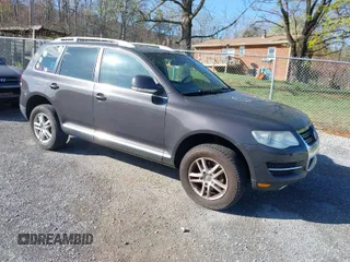 2008 Volkswagen Touareg V6 with VIN WVGBE77L48D064707, listed as a IAAI auction lot 41928938 with 154,710 mi miles and . Bid and sale history available at DreamBid. Image 1.
